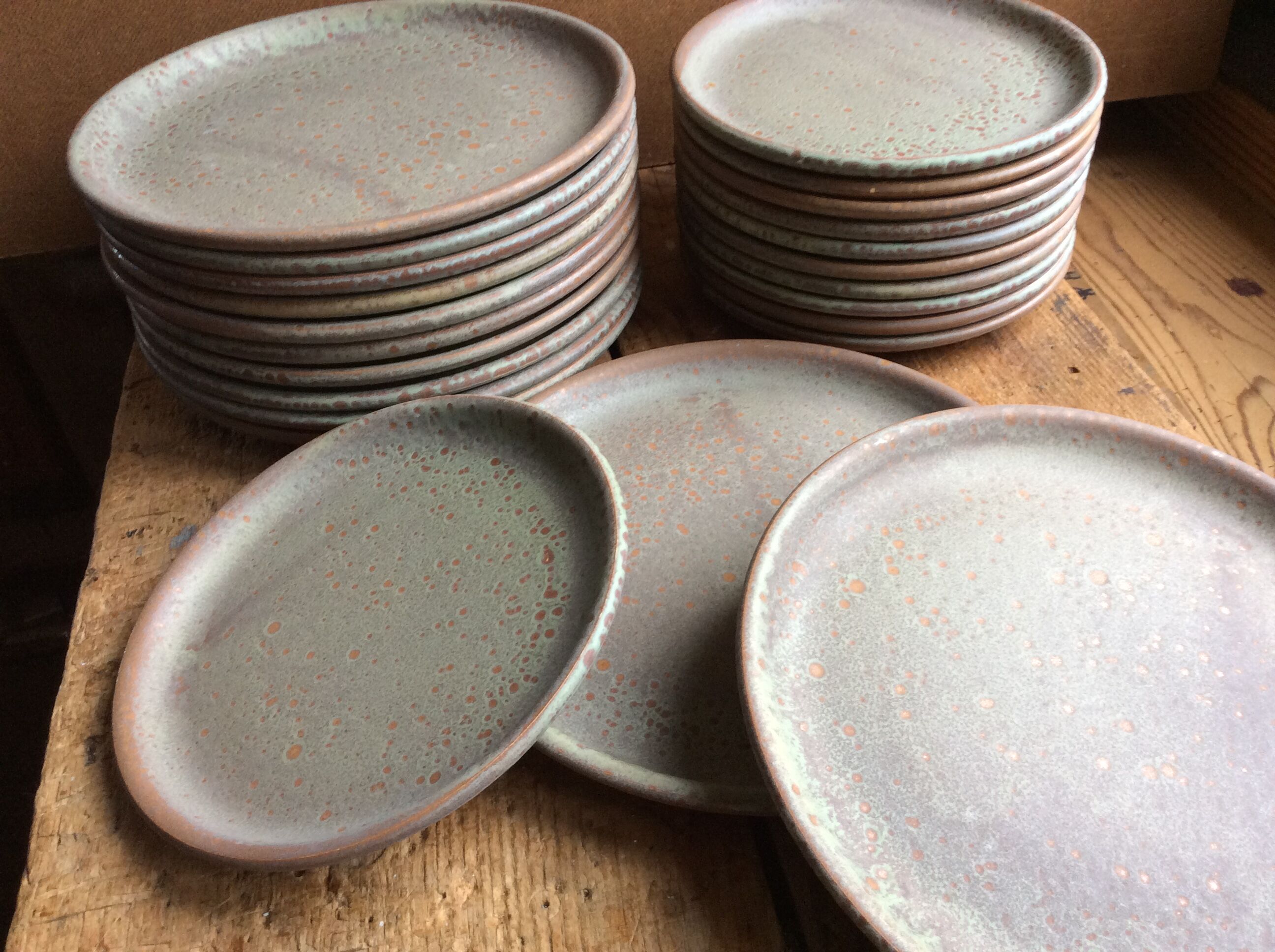 Set of 12 large and 11 small sandstone plates