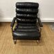 Vintage 1970s black leather armchair – metal frame