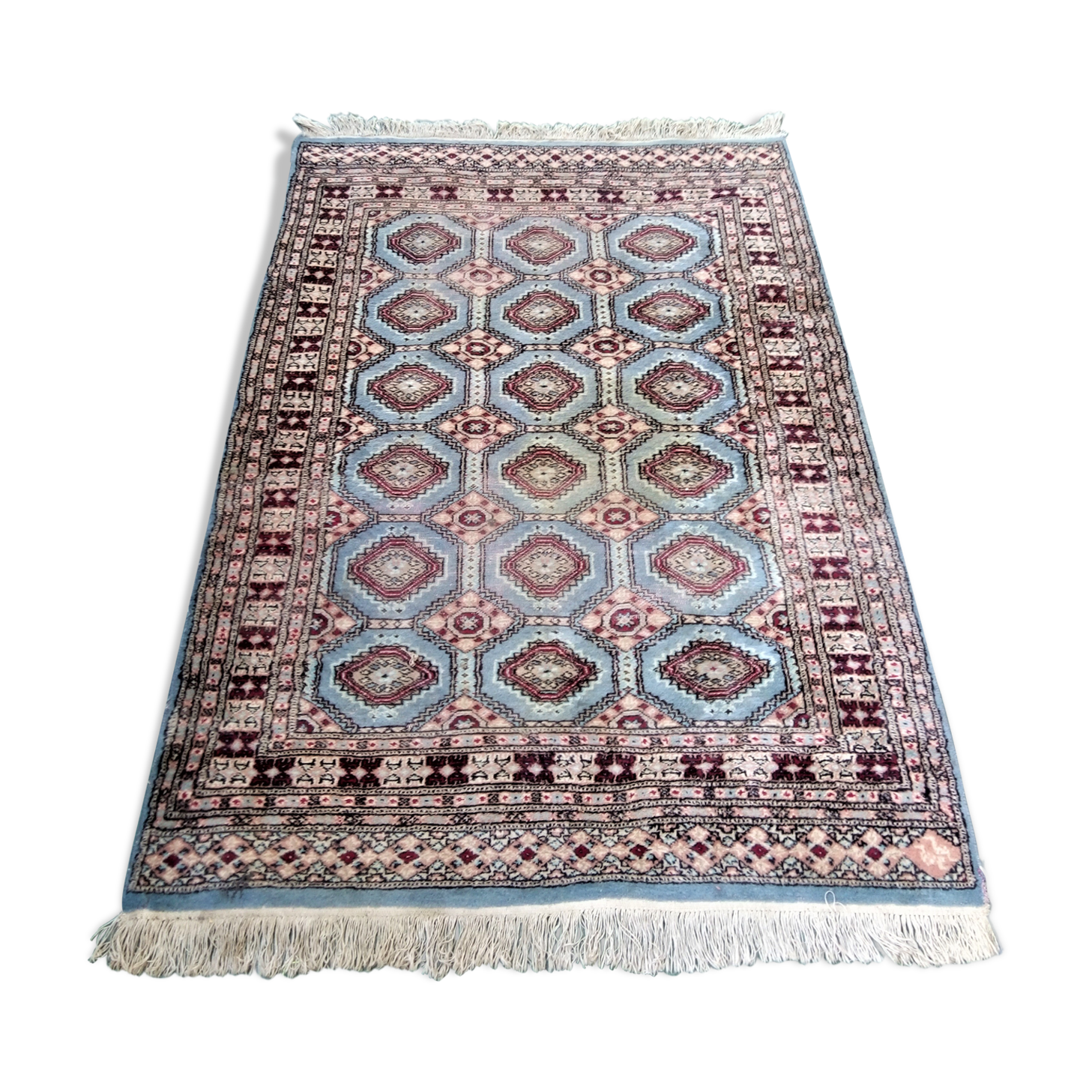 Old handmade wool oriental rug. 190 x 126cm