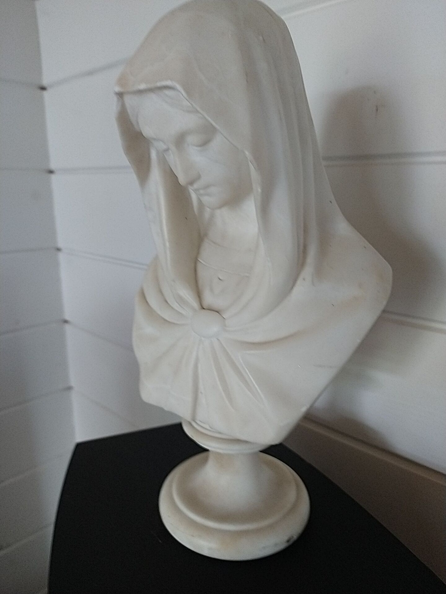 Bust of the Virgin in alabaster by Guglielmo Pugi.