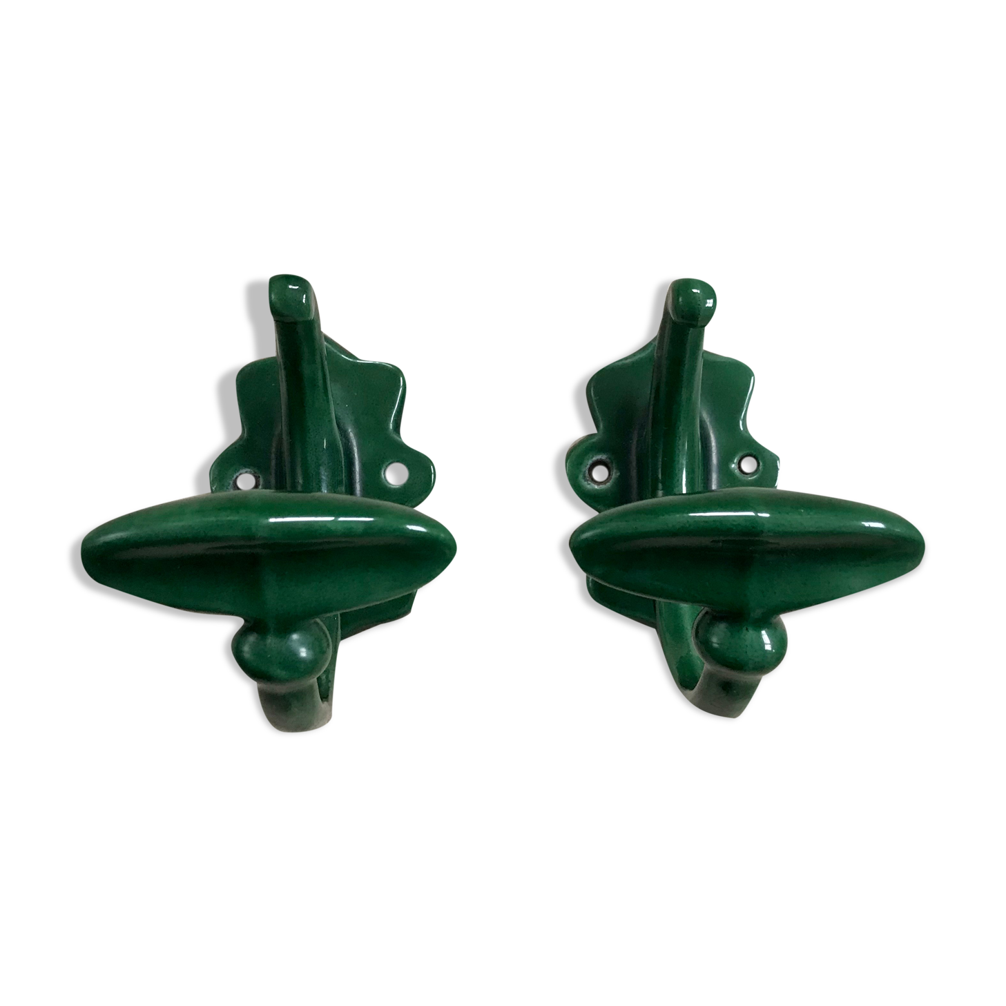 Pair of enamelled cast iron pads