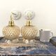 Pair of golden globe wall lights