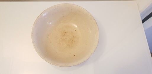 Old porcelain dish on pedestal