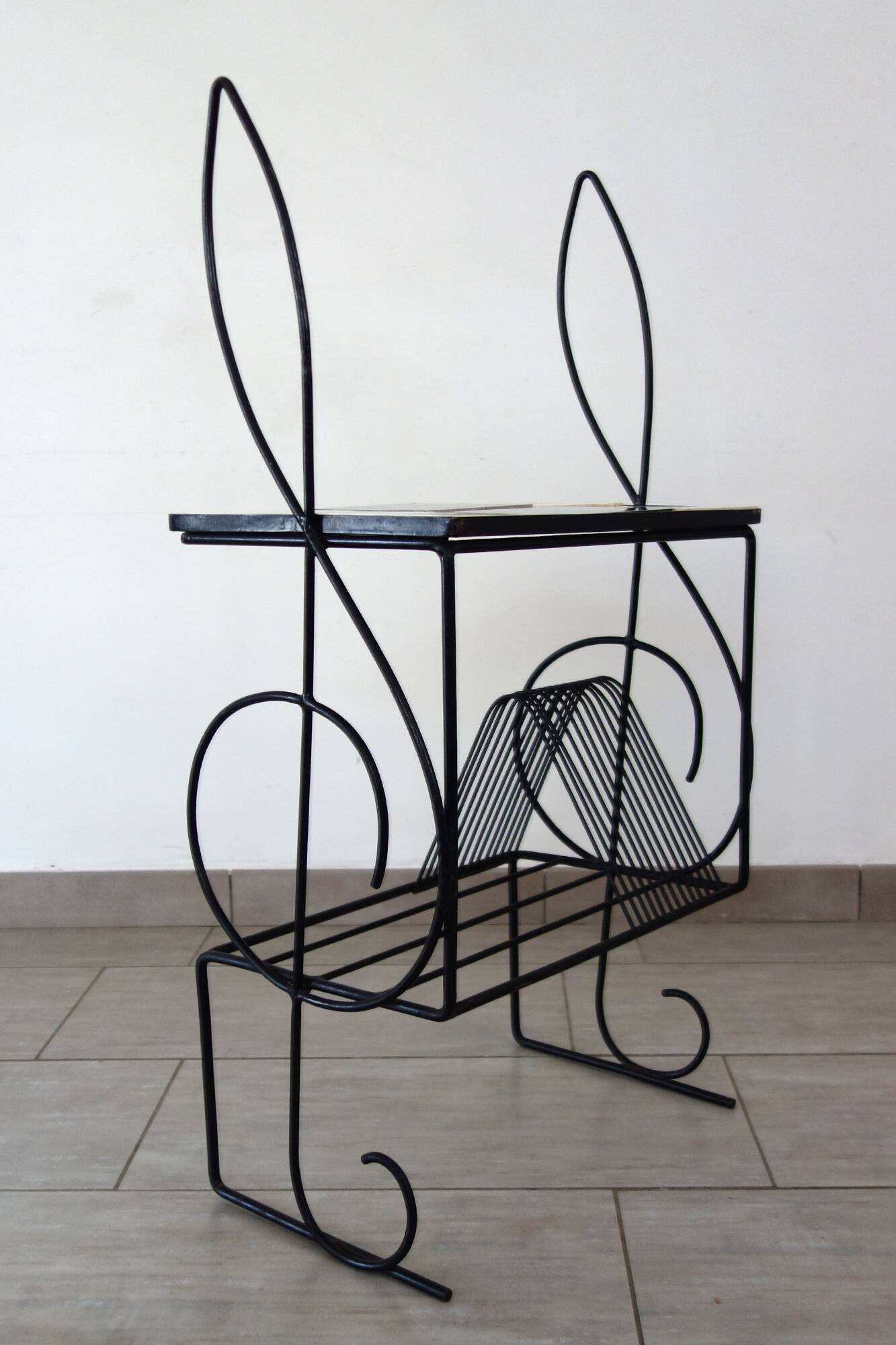 1960s metal and ceramic magazine and record rack