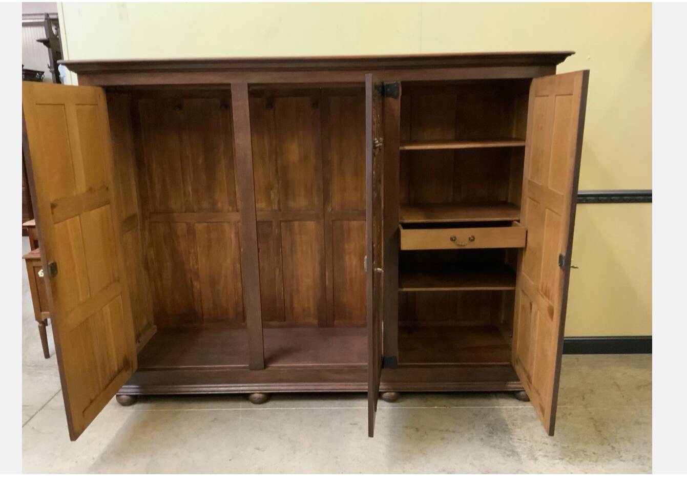 Antique neo-Gothic wardrobe with linen drawers.
