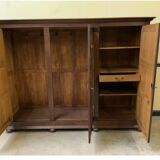 Antique neo-Gothic wardrobe with linen drawers.