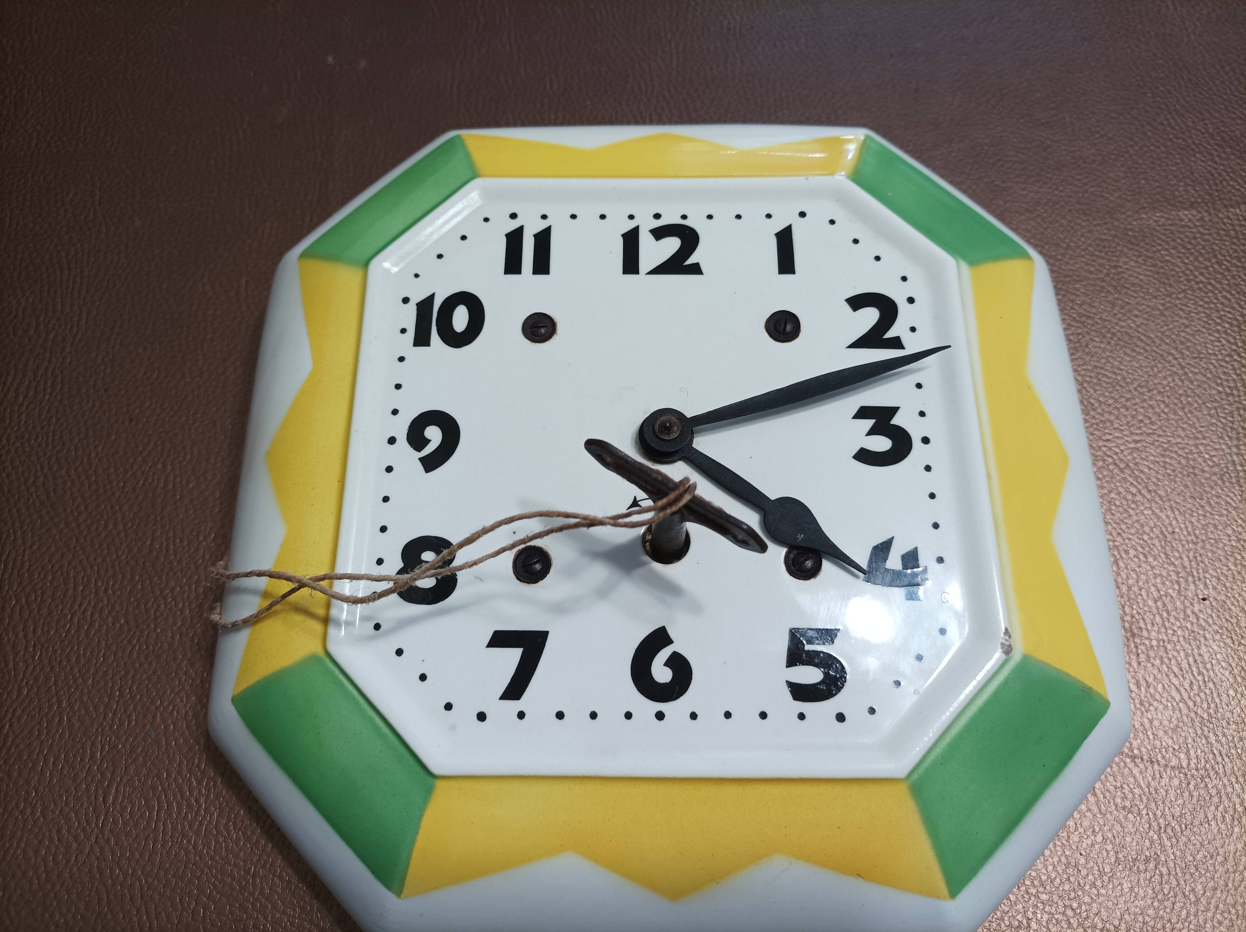 White ceramic wall clock from the 50s/60s