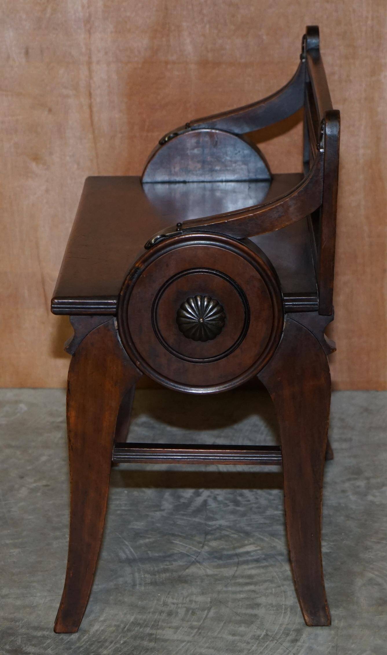 Antique entrance bench by Jas Shoolbred with brass fittings and walnut frame circa 1890.