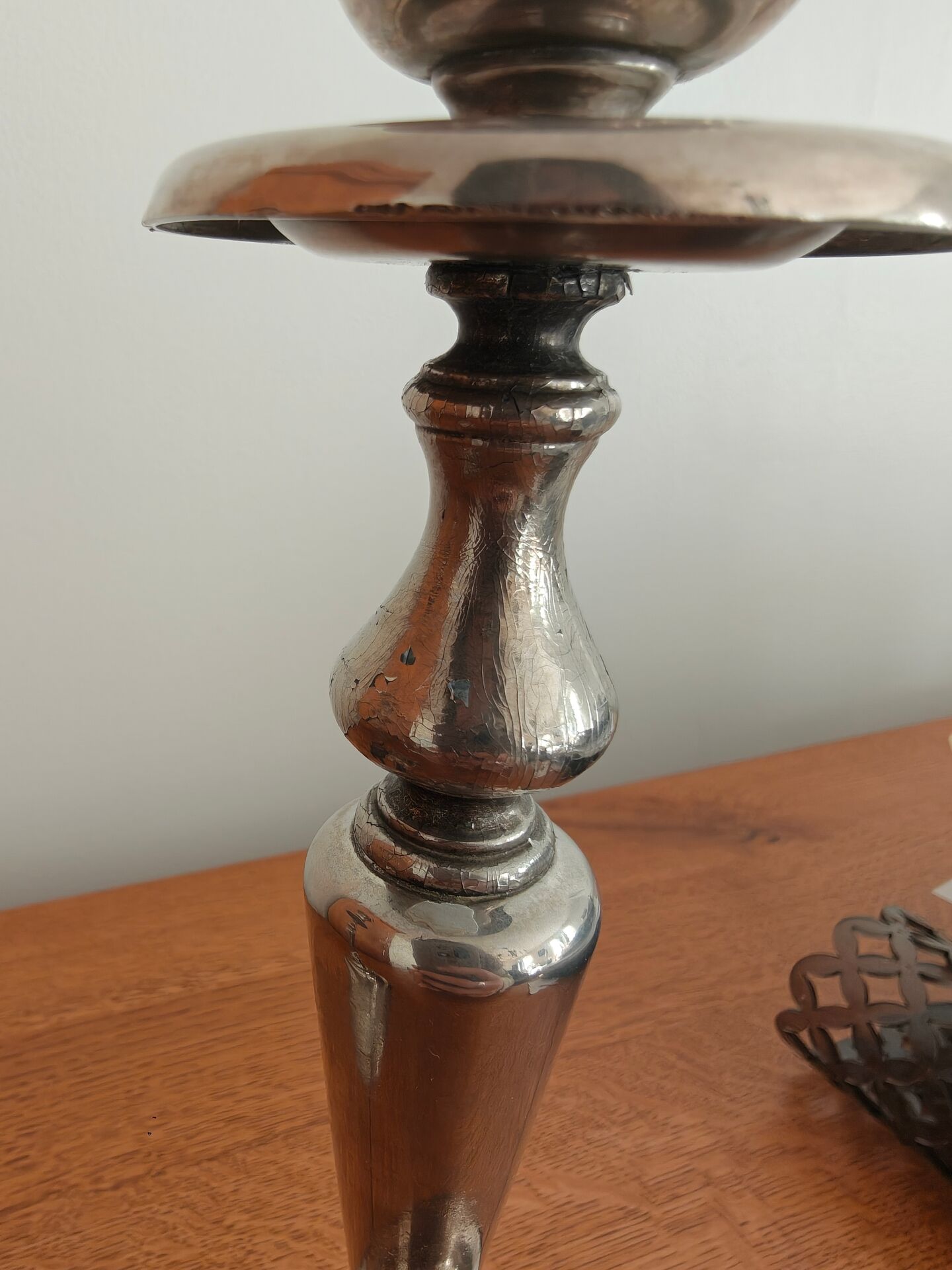 Pair of antique silver-plated candlesticks