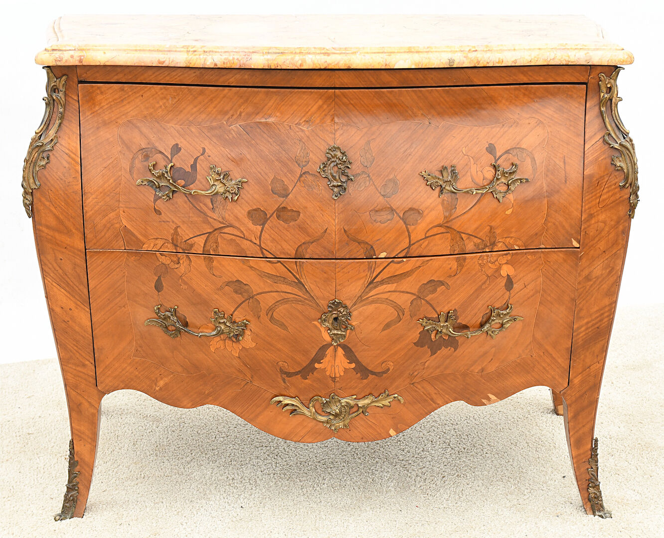 Curved chest of drawers in Louis XV style