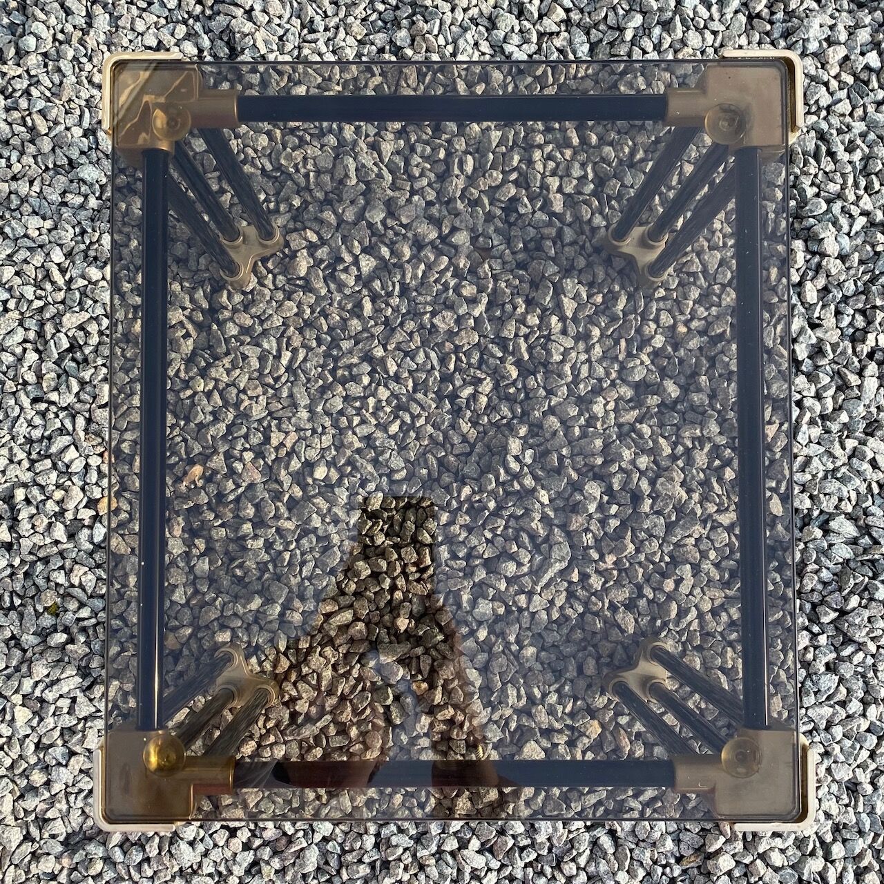 Small square black tubular side table