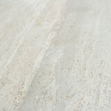 Round Belgian travertine dining table