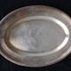 Flat oval silver metal