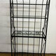Antique wrought iron shelf