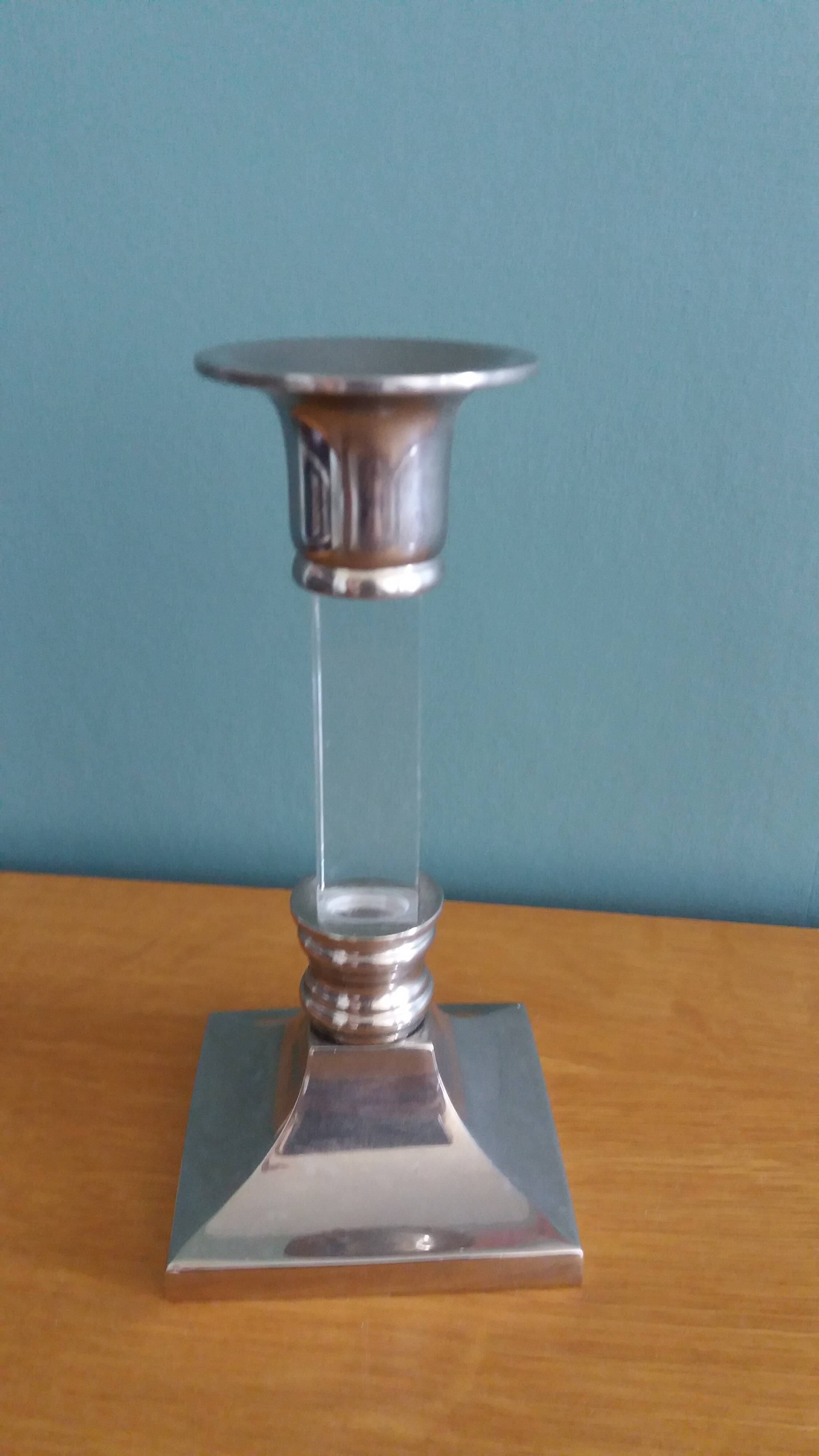 Silver-plated metal candlestick and lucite plexiglass