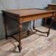 Louis XVI style desk with a curved top, in mahogany.