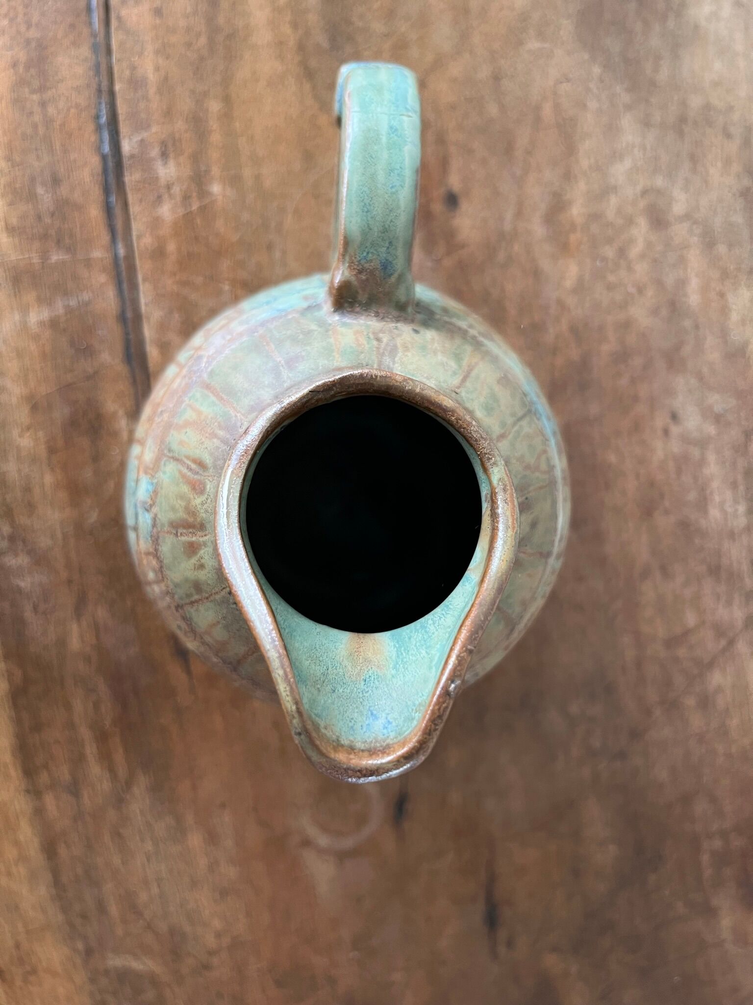 Pitcher in flamed sandstone