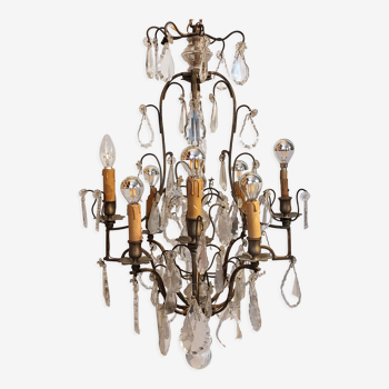 Neoclassical bronze chandelier with 8 lights, tassels and dagger