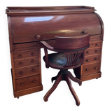 Beautiful vintage 20th-century American cylinder desk and its chair.