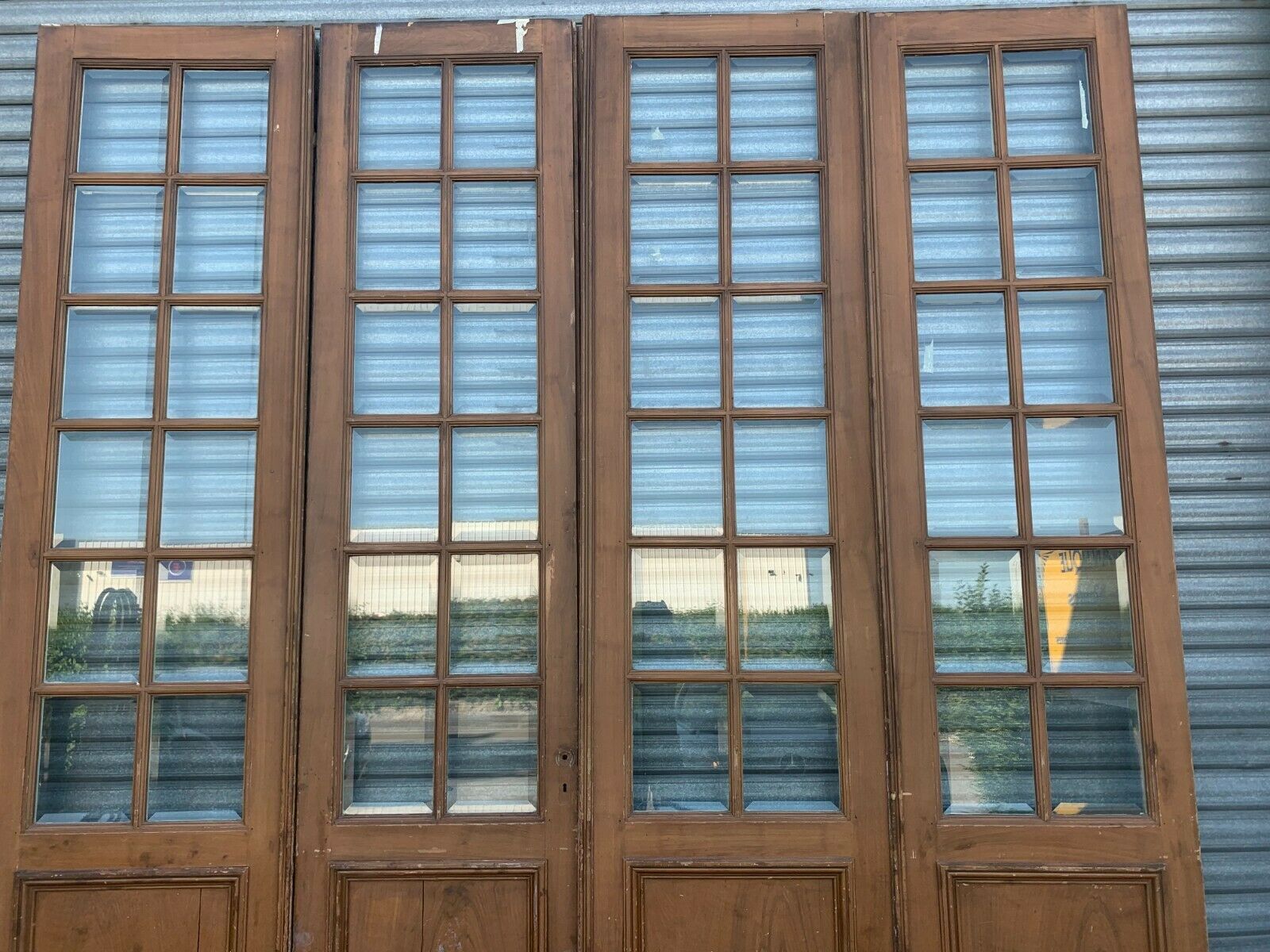 Suite of four separation doors in patinated wood Beveled tiles XX century