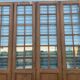 Suite of four separation doors in patinated wood Beveled tiles XX century