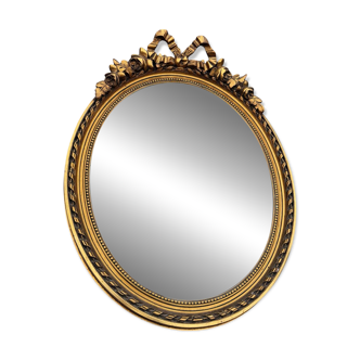 Round mirror with ribbon in Louis XVI style – 19th century