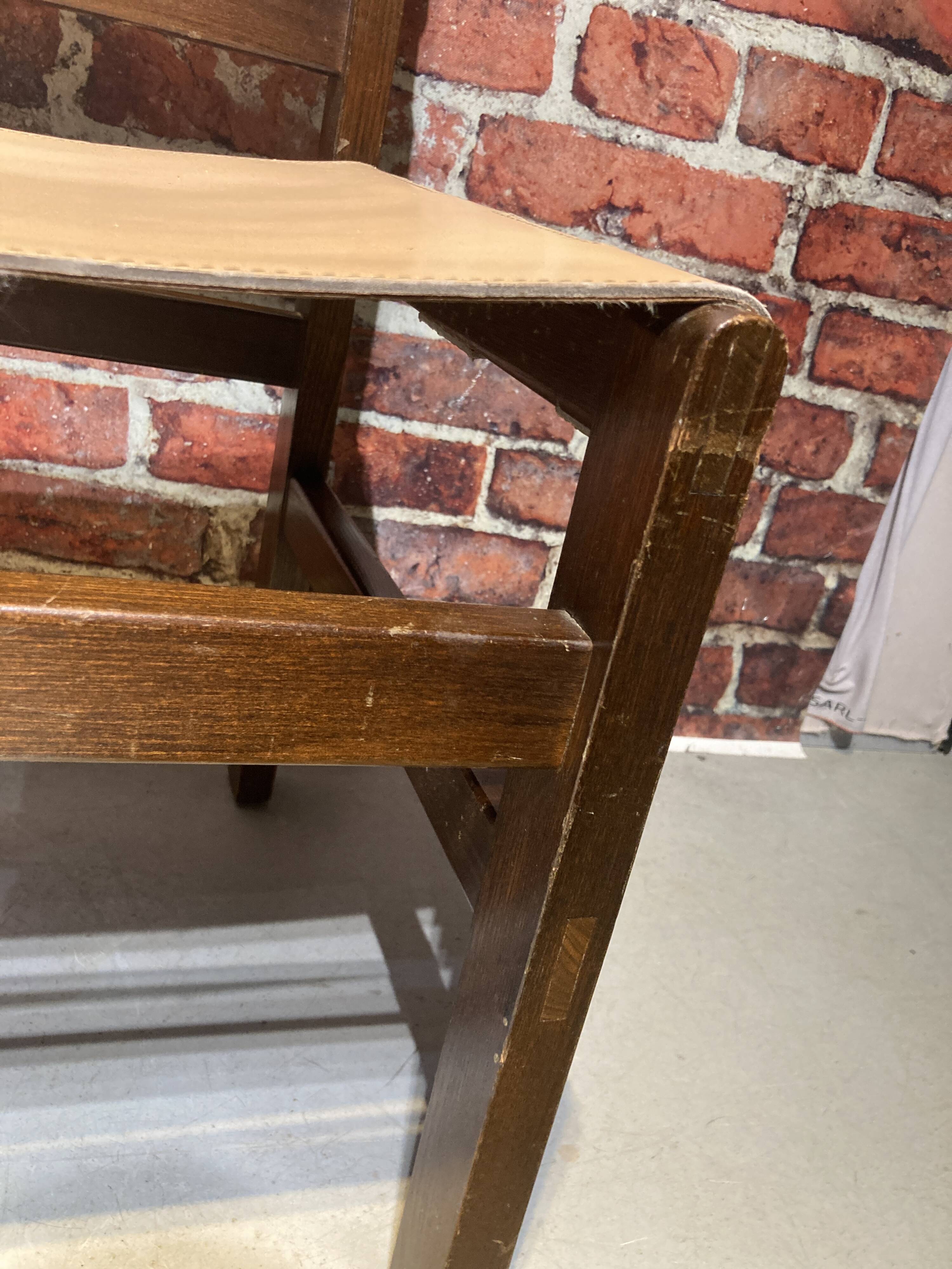 Set of four wooden and leather chairs from Maison Regain