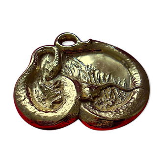 Bronze pocket with natural gold patina and Japanese décor