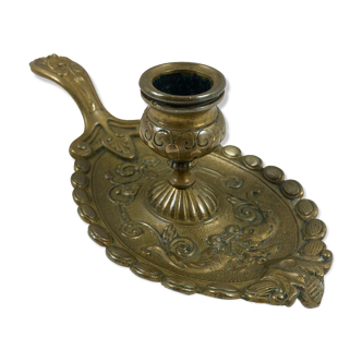 Oval brass hand-held candlestick