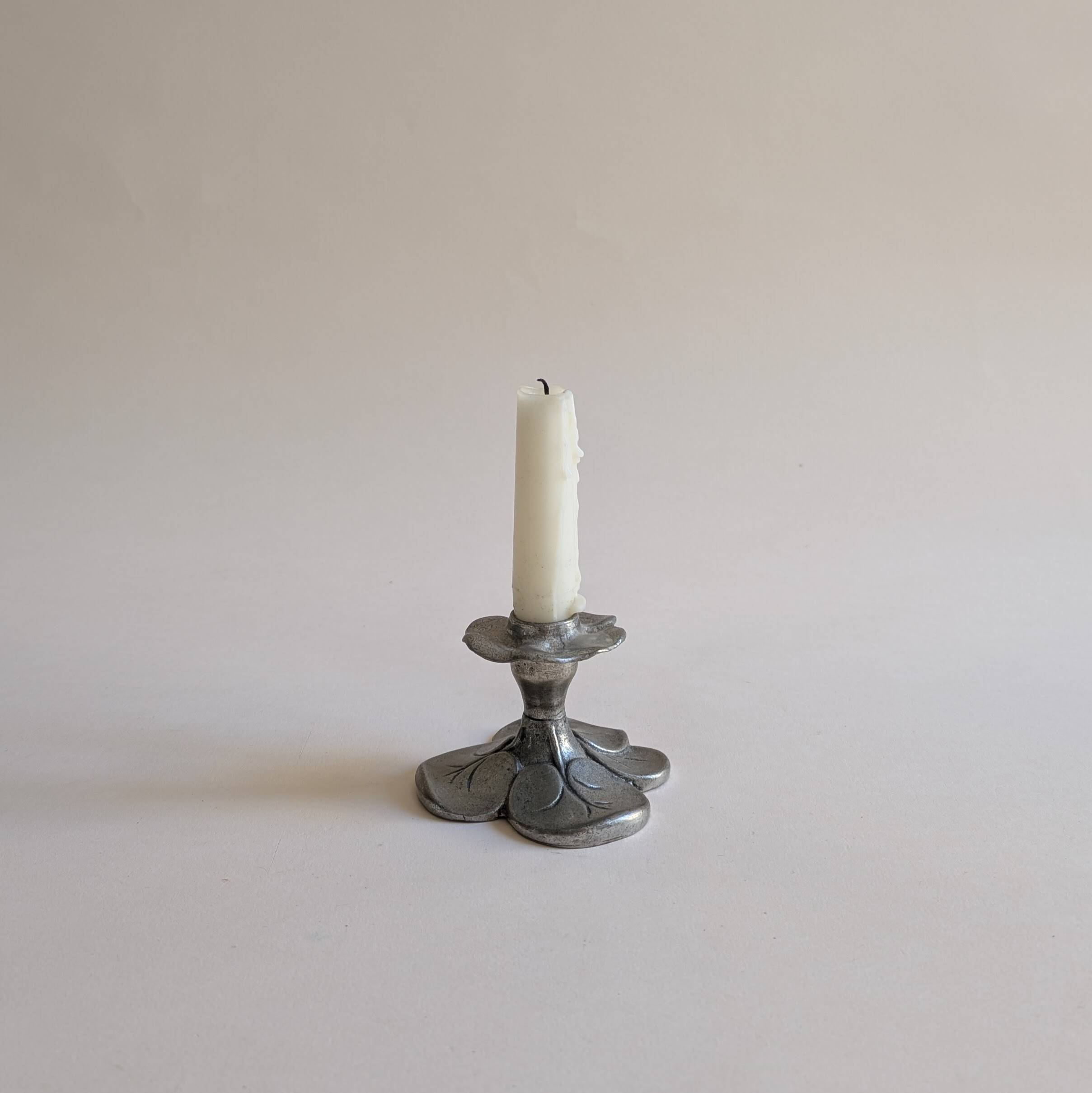 Tin candle holder