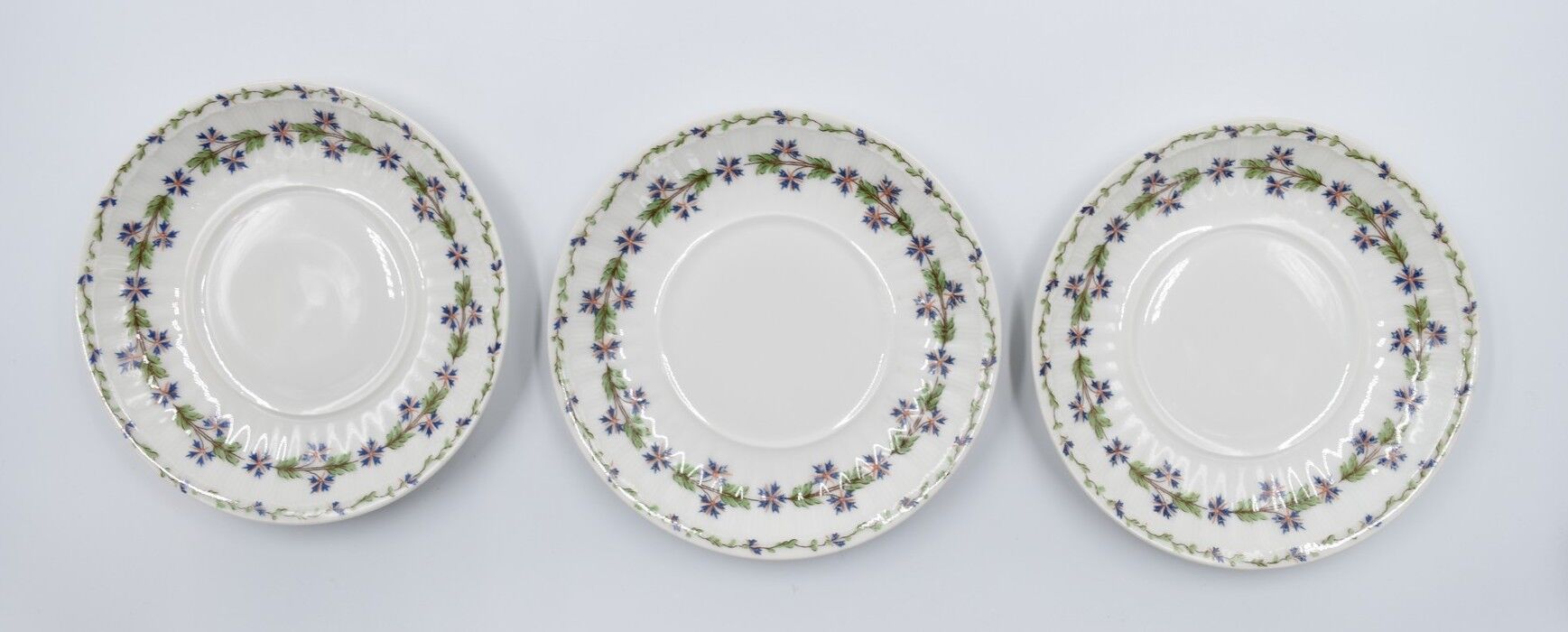 Three cups and under porcelain tea cups from Limoges Haviland barbed-wire décor