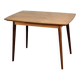 Extendable vintage dining table in teak wood
