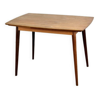 Extendable vintage dining table in teak wood