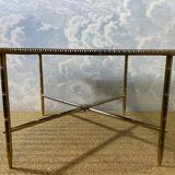 Side table with oxidised metal mirror top on a brass frame, France, 1960s.