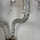 Pair of cut crystal wall sconces in the style of Maydwell and Windle, England, 18th century.