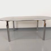 Vintage oval dining table in smoked glass and chrome metal, Space Age style.