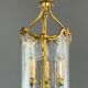 Cylindrical lantern in gilded bronze in the Louis XV style, 20th century.