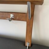 Wall-mounted coat rack with vintage hooks