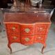 Curved jump commode in Louis XV style with marquetry and gilded bronzes.