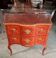 Curved jump commode in Louis XV style with marquetry and gilded bronzes.