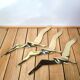 Flight of 3 gulls or brass swallows