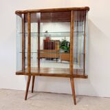 Elegant, curved display cabinet in Art Deco style