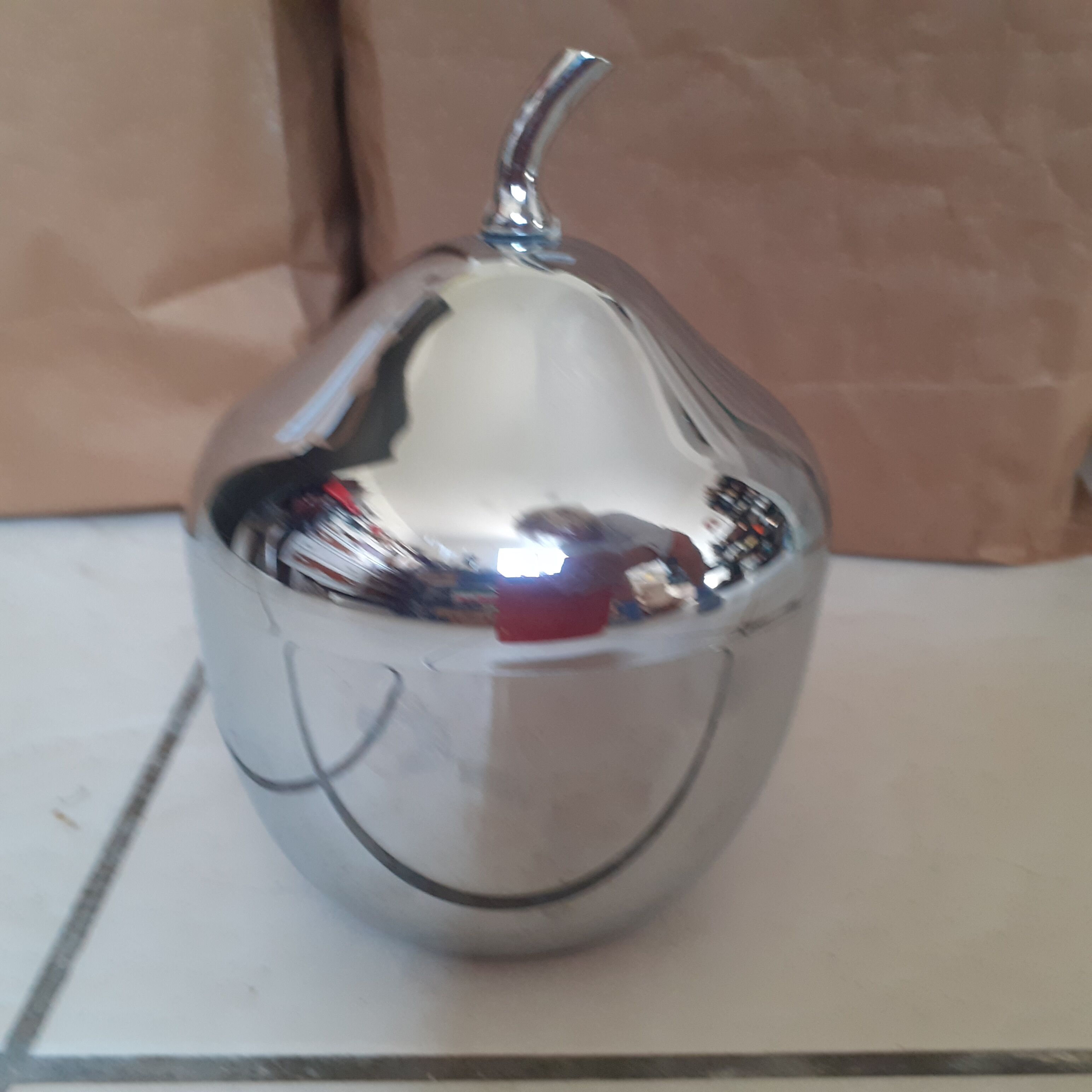 Silver metal ice bucket. Apple shape.