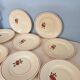Set of 11 hand-painted earthenware plates