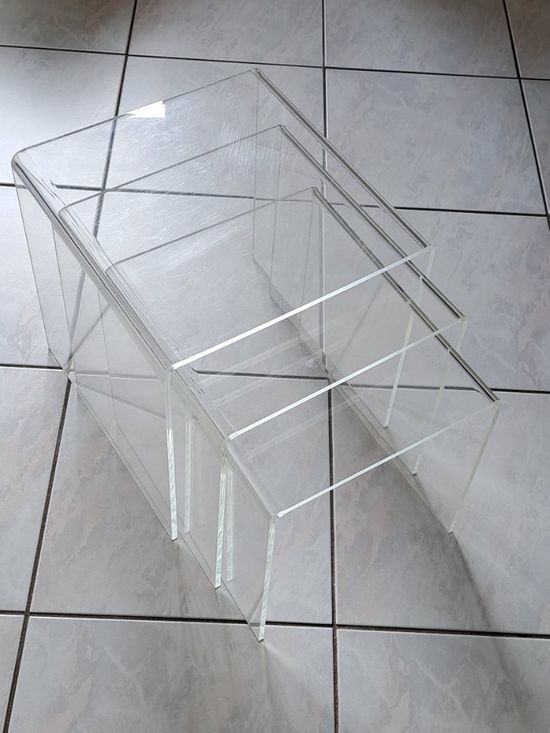 Vintage Mimi pull-out tables set in plexiglass
