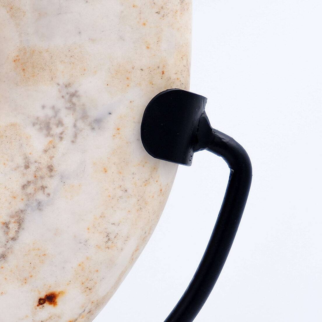 "Wamayuwa" Boiken coin in hand-carved shell mounted on a black metal stand