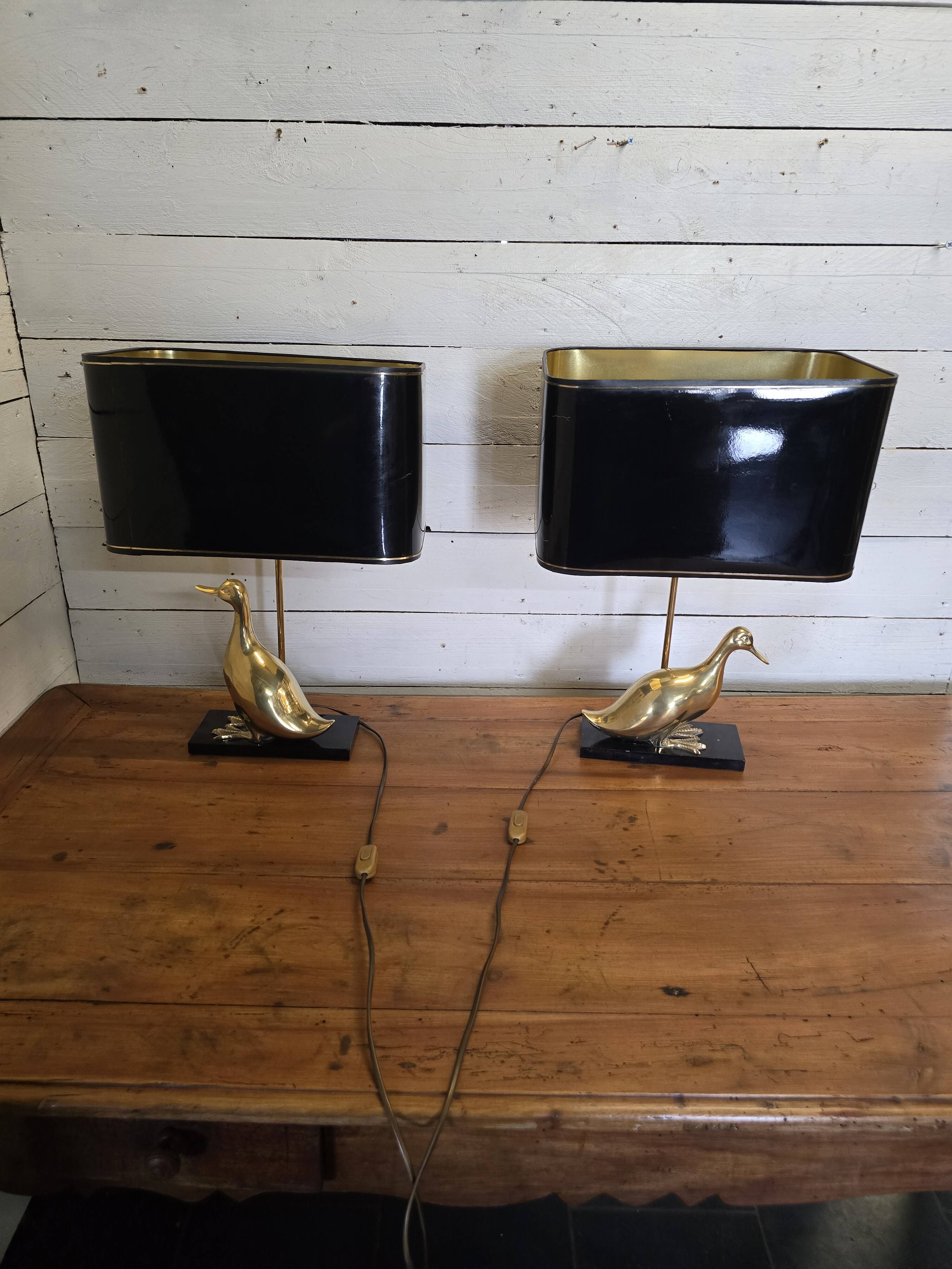 Pair of 70s table lamps featuring a brass duck