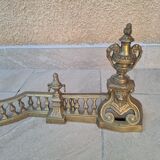 Louis XVI style bronze andirons and fireplace bar