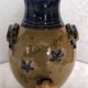 Old belly vinegar in beige and blue enamelled gres
