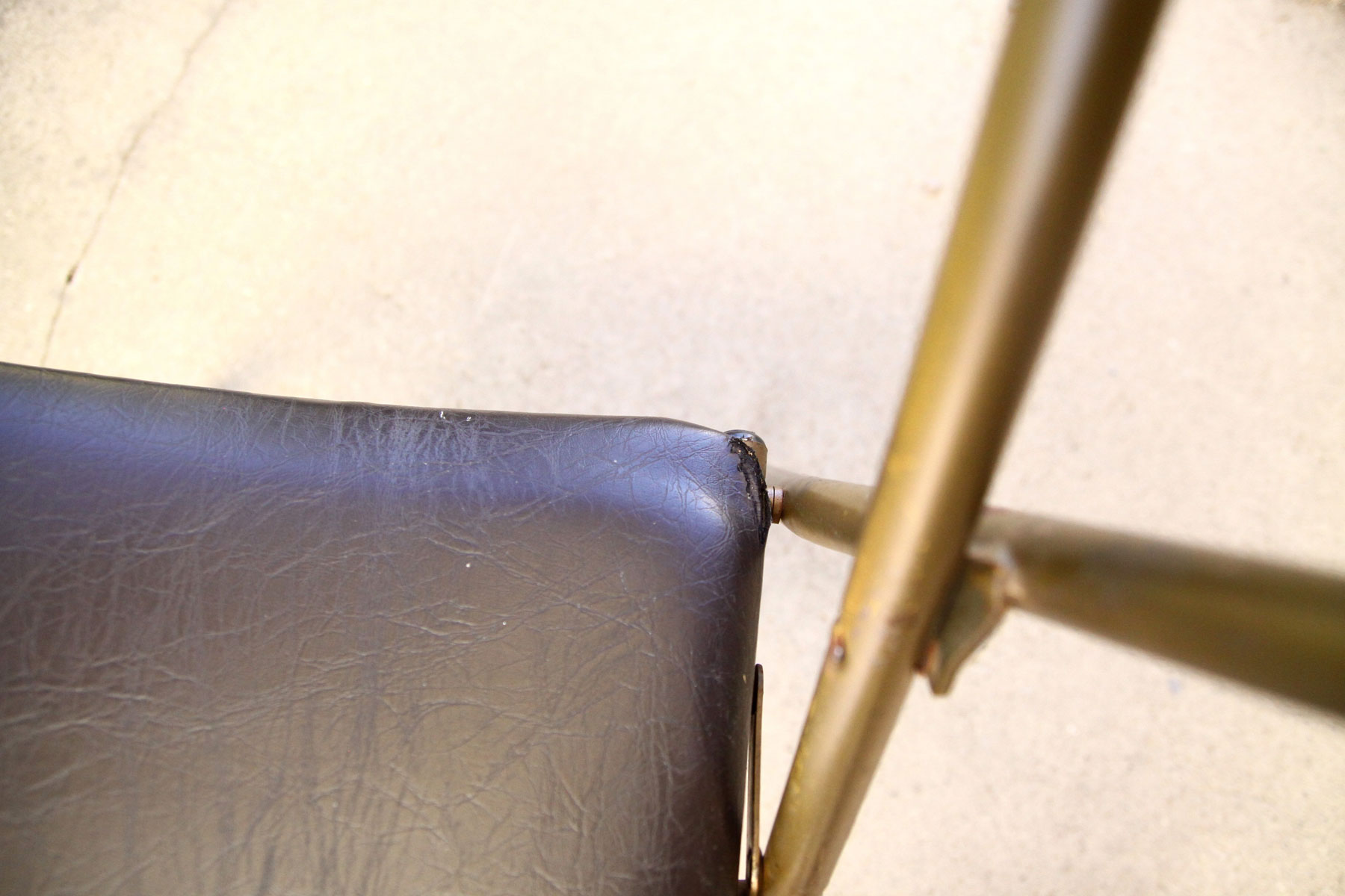 Lot of 4 metal and skai folding chairs